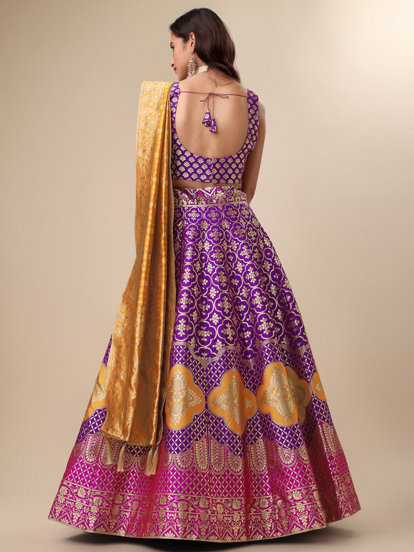 Garnish With Zari Motifs Wine Lehenga Choli