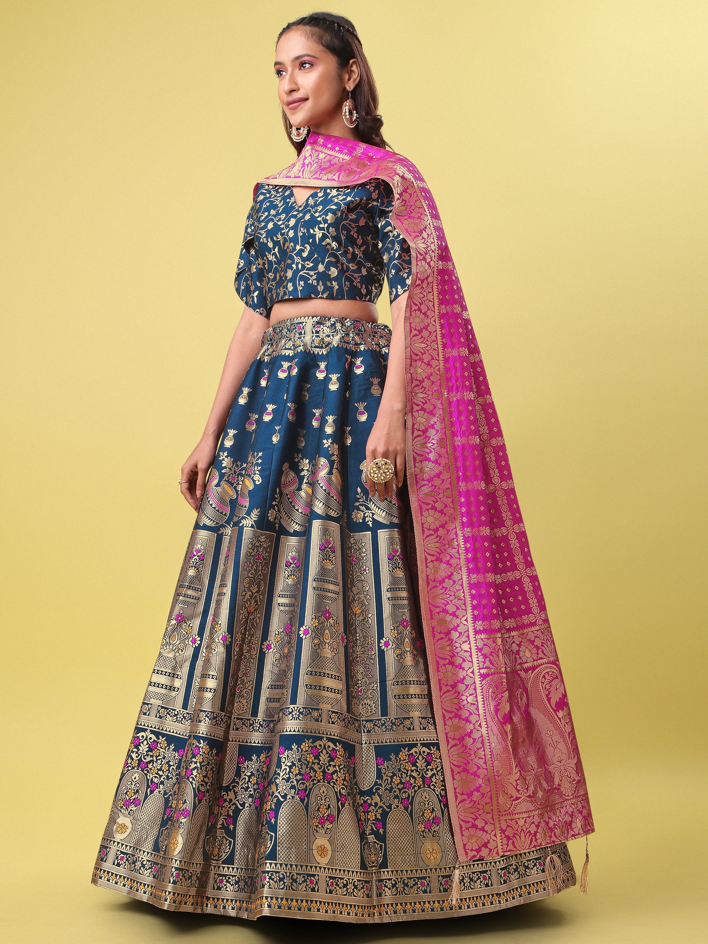 Decorated With Beautiful Flower Motif Rama Lehenga Choli